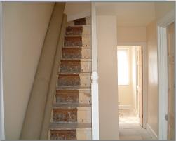 staircase before carpeted